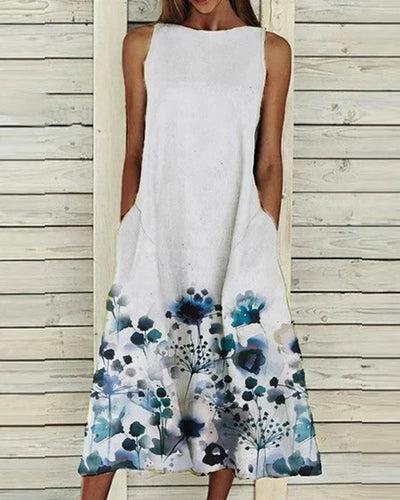 Barbara | Mouwloze dames midijurk met ronde hals en bloemenprint