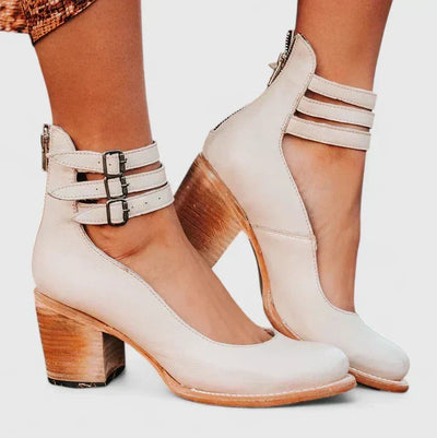 Janelis elegante pumps met blokhak