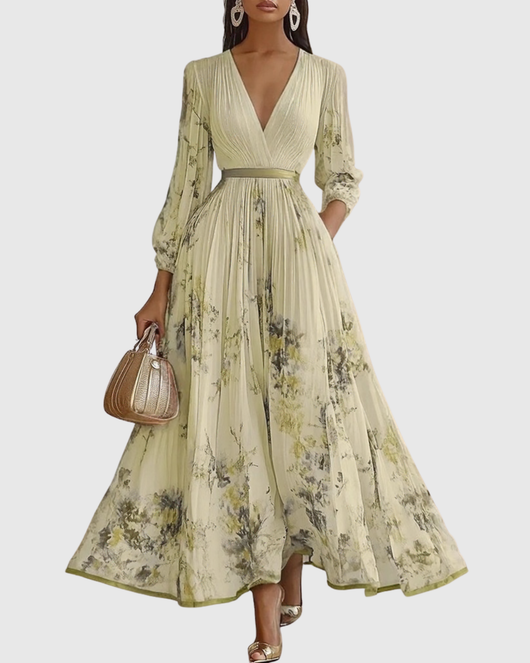 Isabella | Mouwloze geplisseerde dames midijurk met bloemenprint