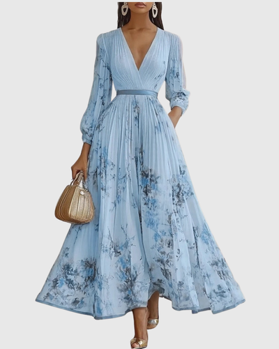 Isabella | Mouwloze geplisseerde dames midijurk met bloemenprint