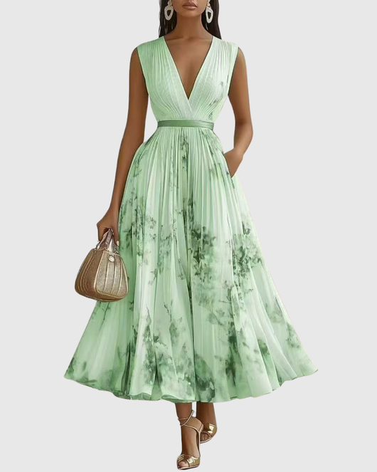 Isabella | Mouwloze geplisseerde dames midijurk met bloemenprint