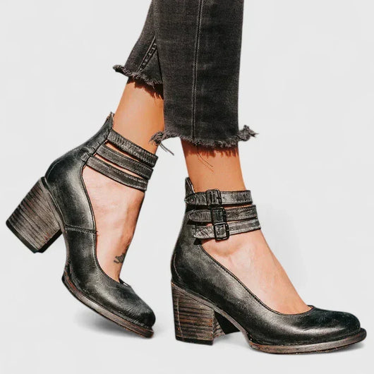 Janelis elegante pumps met blokhak