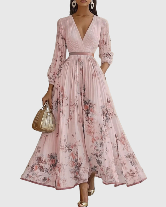 Isabella | Mouwloze geplisseerde dames midijurk met bloemenprint
