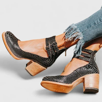 Janelis elegante pumps met blokhak