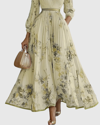 Isabella | Mouwloze geplisseerde dames midijurk met bloemenprint