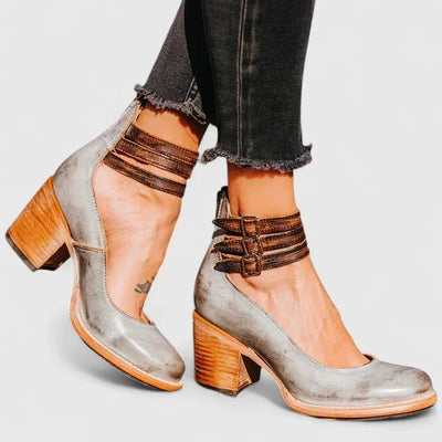 Janelis elegante pumps met blokhak