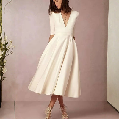 Tanja | Elegante uitlopende dames midijurk voor bruiloftsgasten