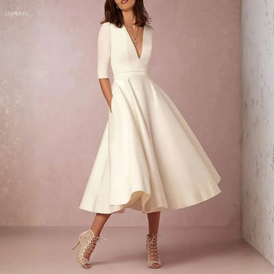 Tanja | Elegante uitlopende dames midijurk voor bruiloftsgasten