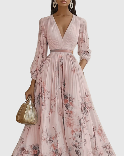 Isabella | Mouwloze geplisseerde dames midijurk met bloemenprint
