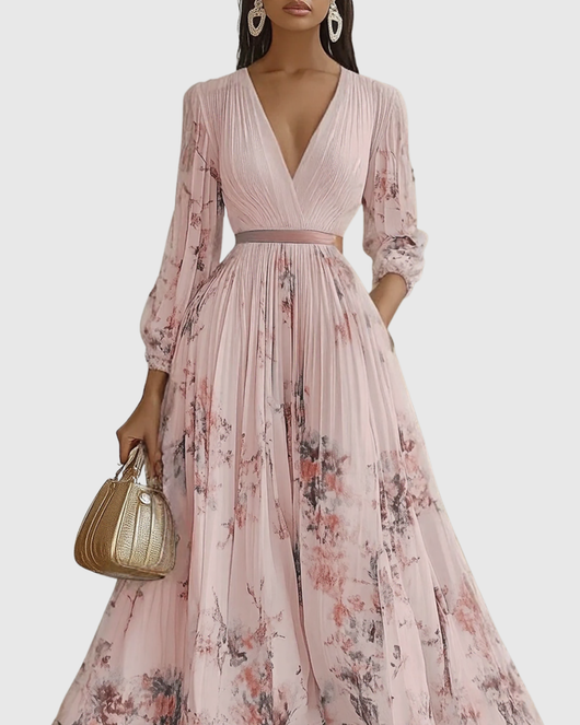 Isabella | Mouwloze geplisseerde dames midijurk met bloemenprint