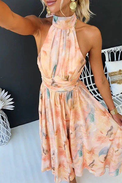 Claudia | Dames zomermaxijurk met halterhals en bloemenprint