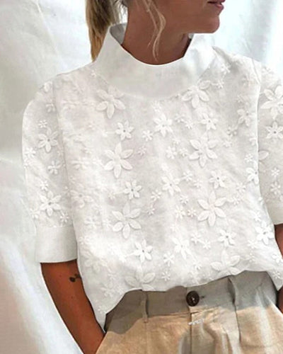 Stefanie | Damesblouse met hoge kraag en bloemenprint