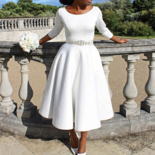 Felicia | Sobere dames midijurk met ronde hals