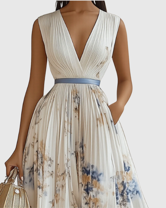 Isabella | Mouwloze geplisseerde dames midijurk met bloemenprint