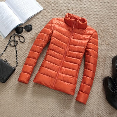 Kerstin | Modieus glanzend kort dames winterjack