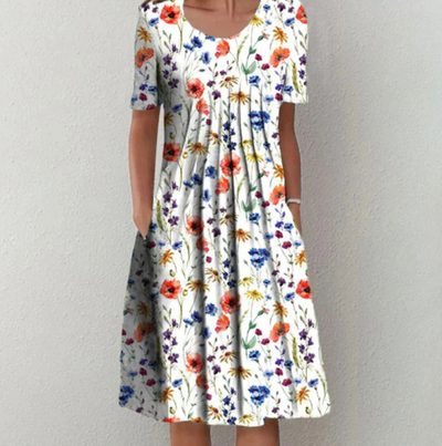 Tamara | Losvallende dames midijurk met bloemenprint