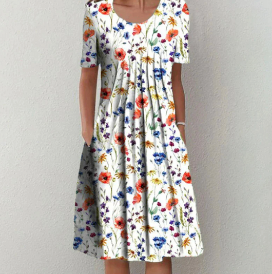 Tamara | Losvallende dames midijurk met bloemenprint