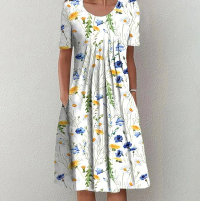 Tamara | Losvallende dames midijurk met bloemenprint