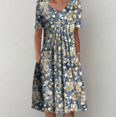Tamara | Losvallende dames midijurk met bloemenprint
