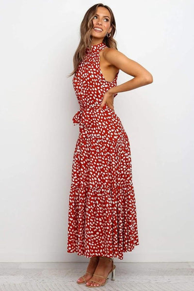 Karin | Dames maxijurk met print, halterhals en taillestrik