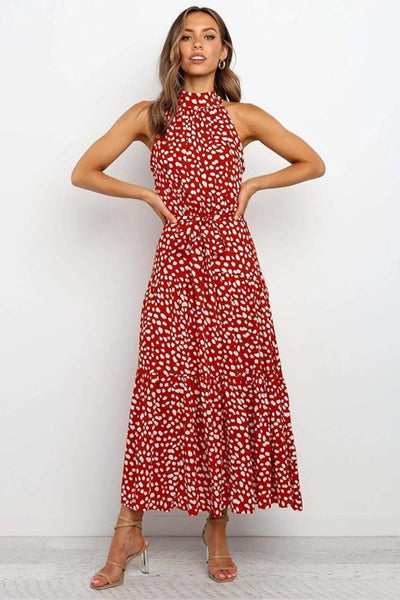 Karin | Dames maxijurk met print, halterhals en taillestrik