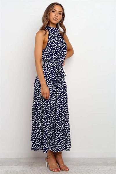 Karin | Dames maxijurk met print, halterhals en taillestrik