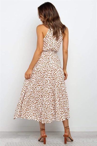Karin | Dames maxijurk met print, halterhals en taillestrik