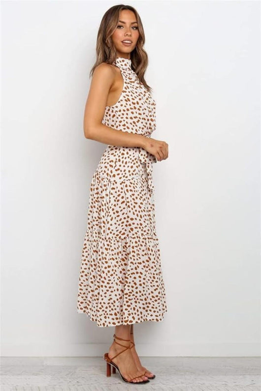 Karin | Dames maxijurk met print, halterhals en taillestrik