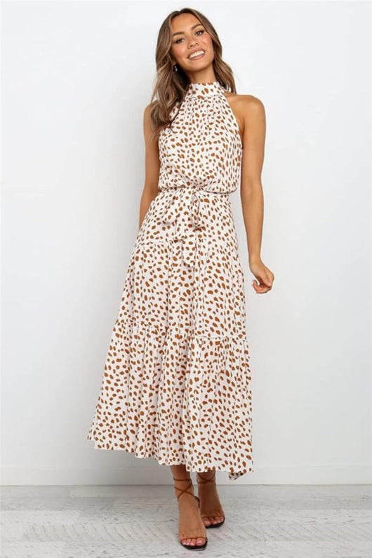 Karin | Dames maxijurk met print, halterhals en taillestrik