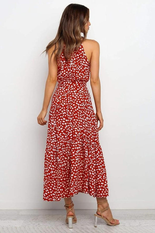 Karin | Dames maxijurk met print, halterhals en taillestrik
