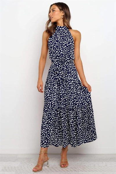 Karin | Dames maxijurk met print, halterhals en taillestrik