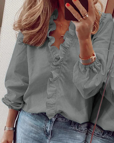 Katharina | Elegante dames wikkelblouse met ruchebies