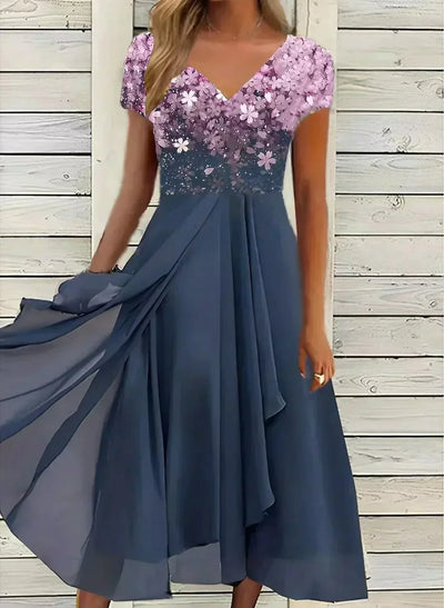 Yvonne | Vloeiende dames jurk met bloemenprint en korte mouwen