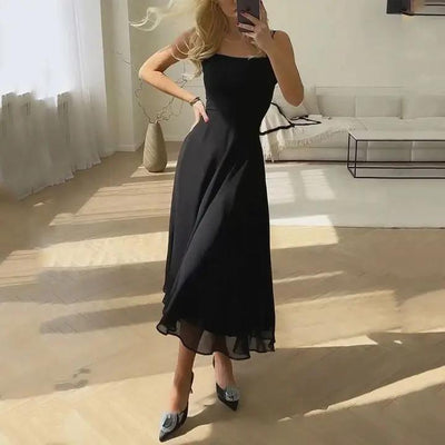 Riley | Mouwloze midi-jurk