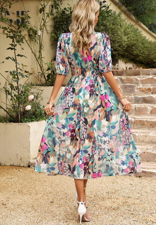 Doris | Dames wikkelmidijurk met abstracte print