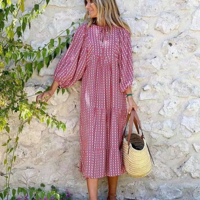 Flora | Boho maxijurk met print, pofmouwen en V-hals