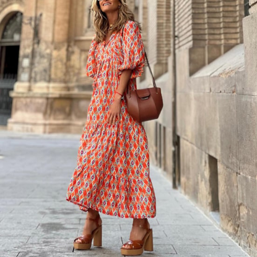 Flora | Boho maxijurk met print, pofmouwen en V-hals