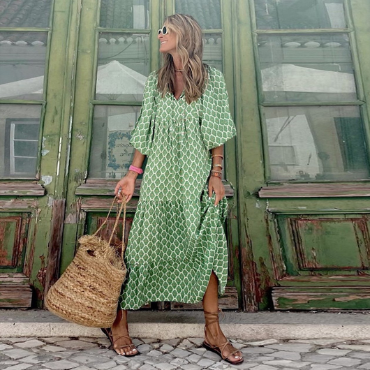 Flora | Boho maxijurk met print, pofmouwen en V-hals