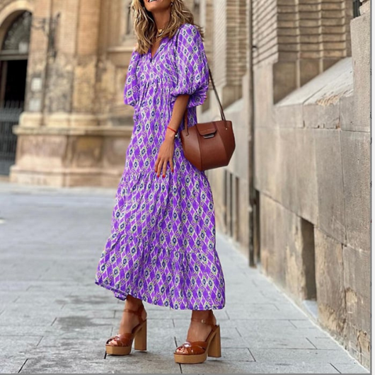 Flora | Boho maxijurk met print, pofmouwen en V-hals
