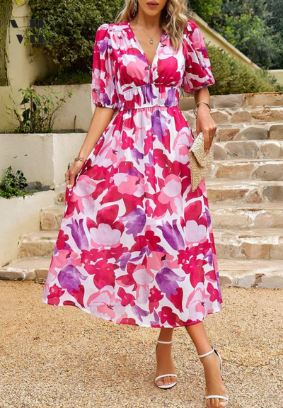 Doris | Dames wikkelmidijurk met abstracte print