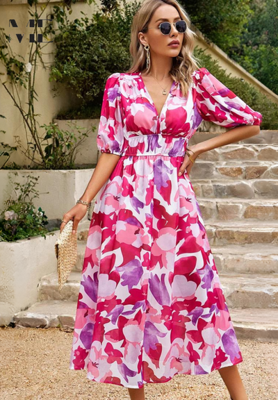 Doris | Dames wikkelmidijurk met abstracte print