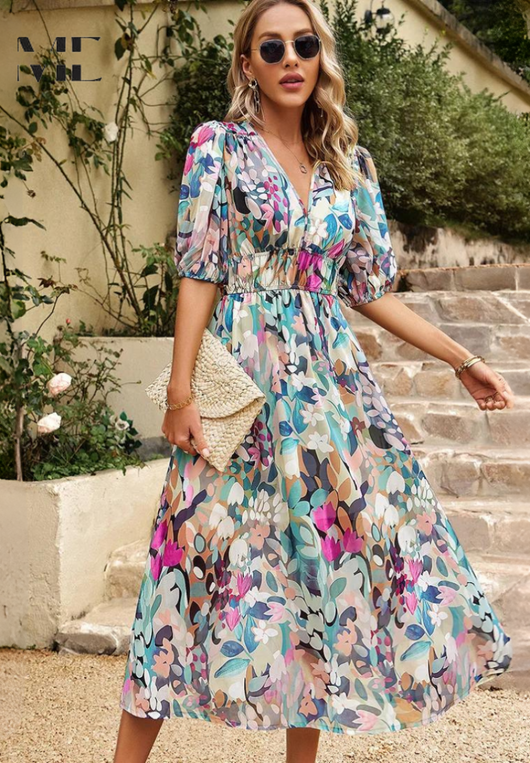 Doris | Dames wikkelmidijurk met abstracte print