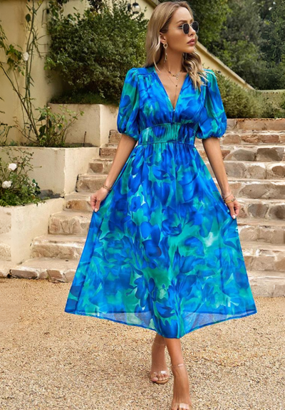 Doris | Dames wikkelmidijurk met abstracte print