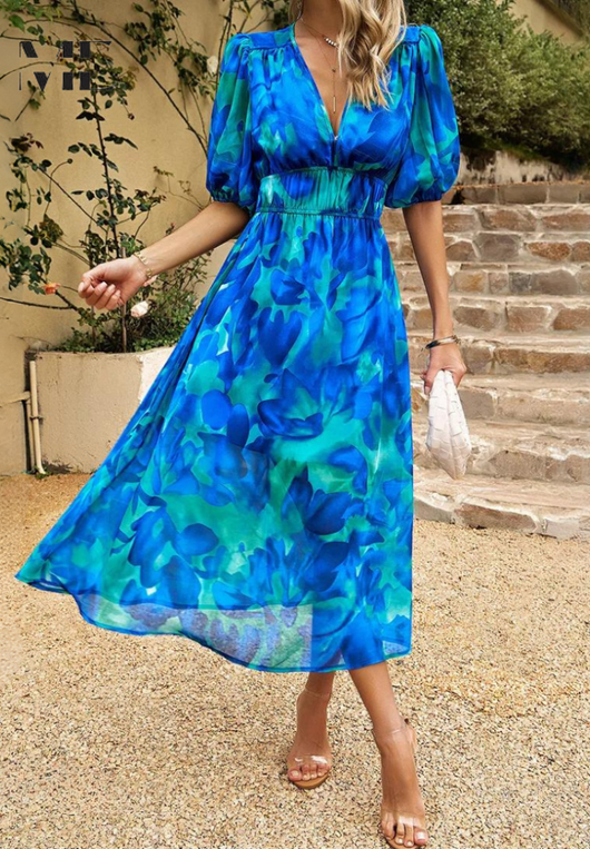 Doris | Dames wikkelmidijurk met abstracte print