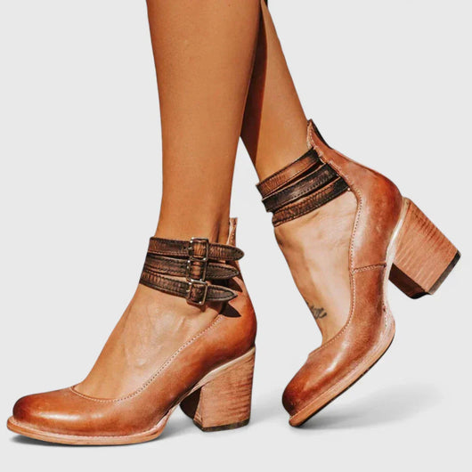 Janelis elegante pumps met blokhak