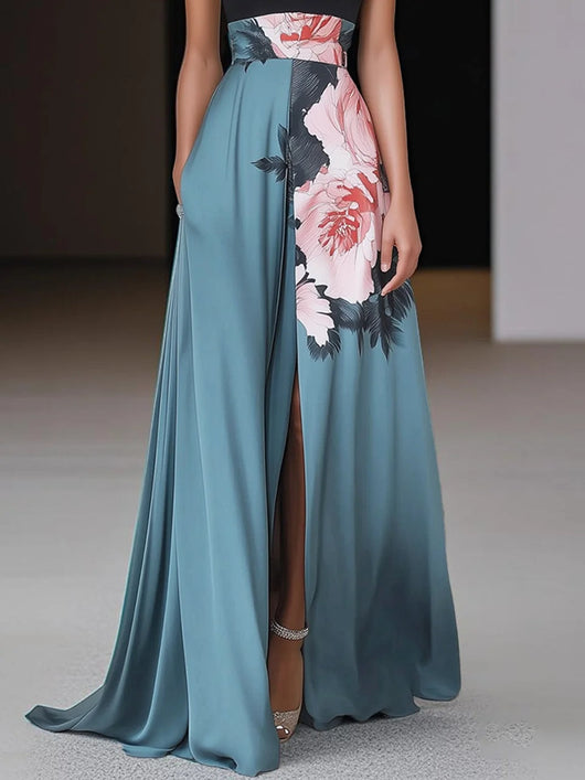 Angela | Chique zwarte mouwloze dames maxijurk met bloemenprint en split
