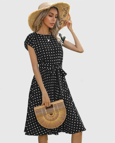Veronika | Dames midijurk met korte mouwen en plooirok
