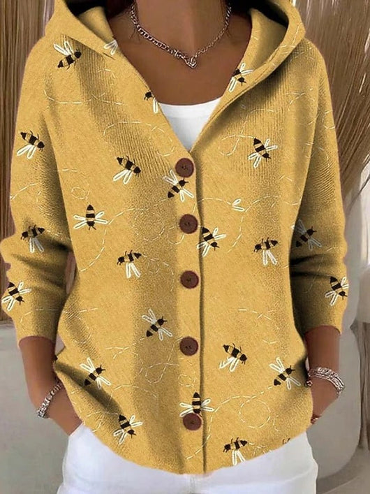 Marie | Kleurrijk damesvest met capuchon en knoopsluiting