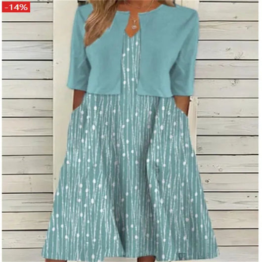 Emilia | Dames midijurk met bloemendessin, ronde hals en zijzakken