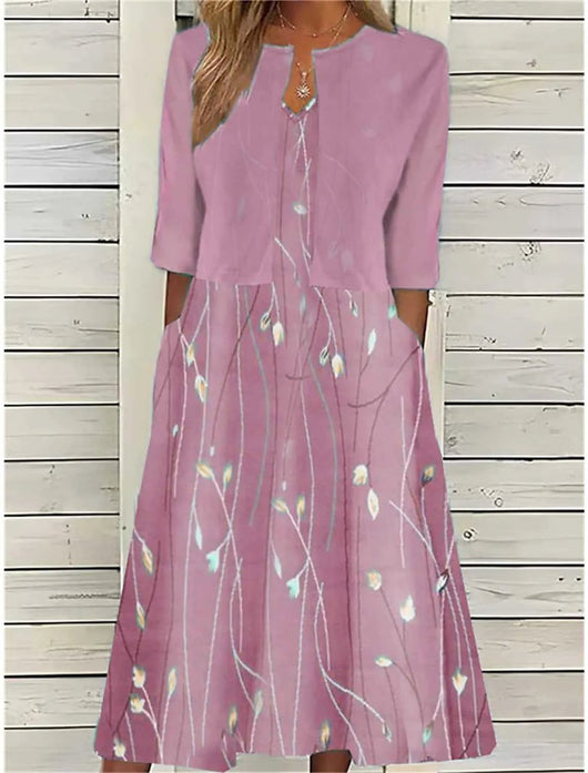 Emilia | Dames midijurk met bloemendessin, ronde hals en zijzakken